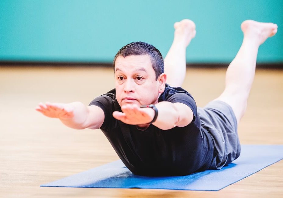 locust-pose Yogi Bene locust pose during yoga class